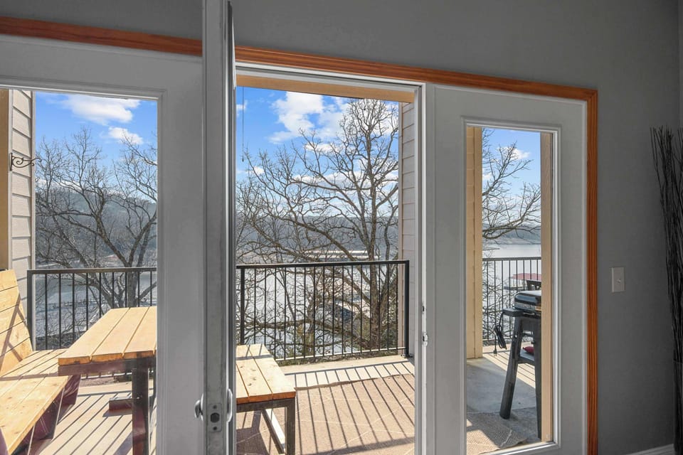 Lounge the day away or dine alfresco with gorgeous lake views on the deck​