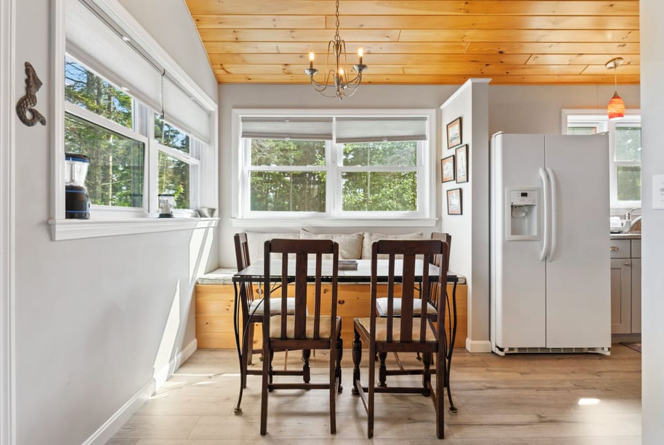 Dining area with views out to water.