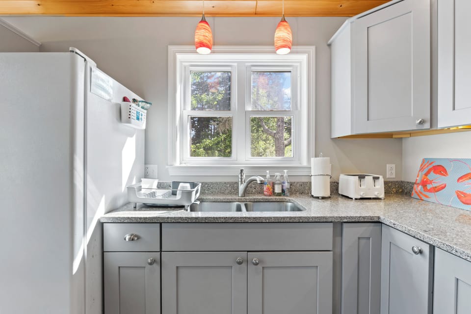 Alternate view of kitchen.