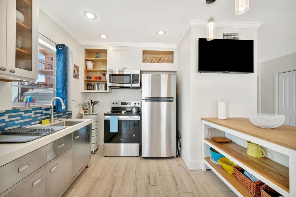 Full kitchen with stainless steel appliances