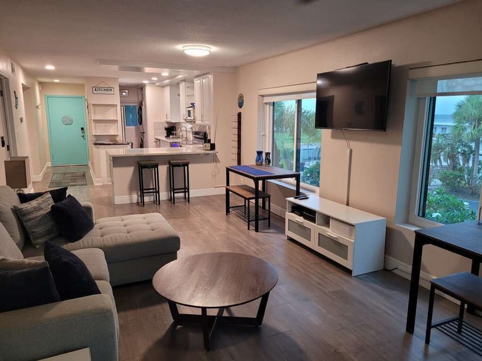 Spacious living room with TV and seating