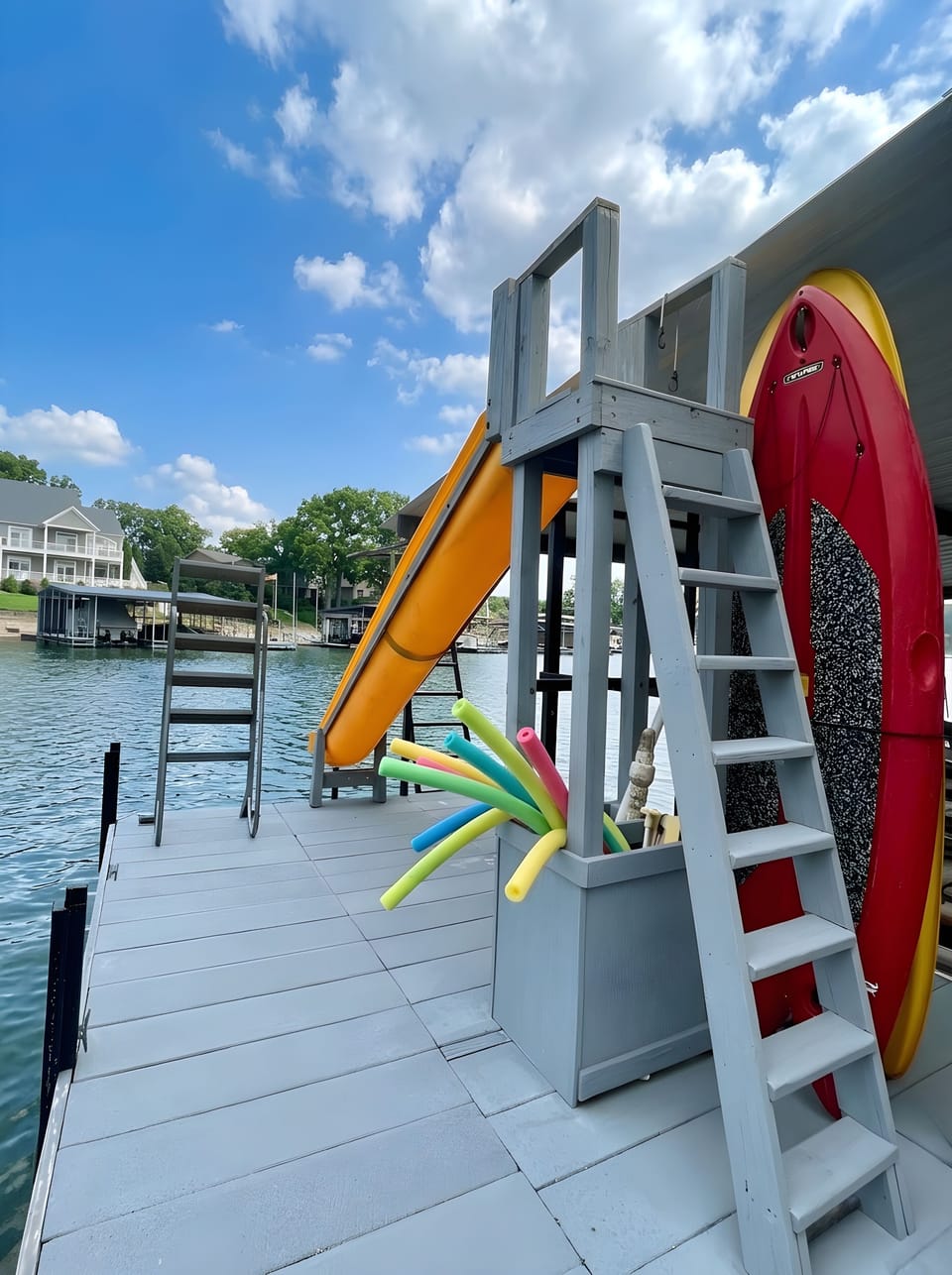 Slide into the lake, jump off the dive platform or swing on the rope-so fun!