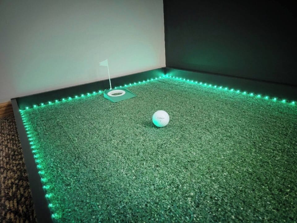 14' putting green is always open and LED-illuminated!