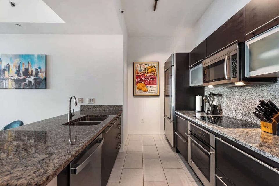 Modern kitchen fully equipped with all major appliances, cookware, and essentials for home-style meals