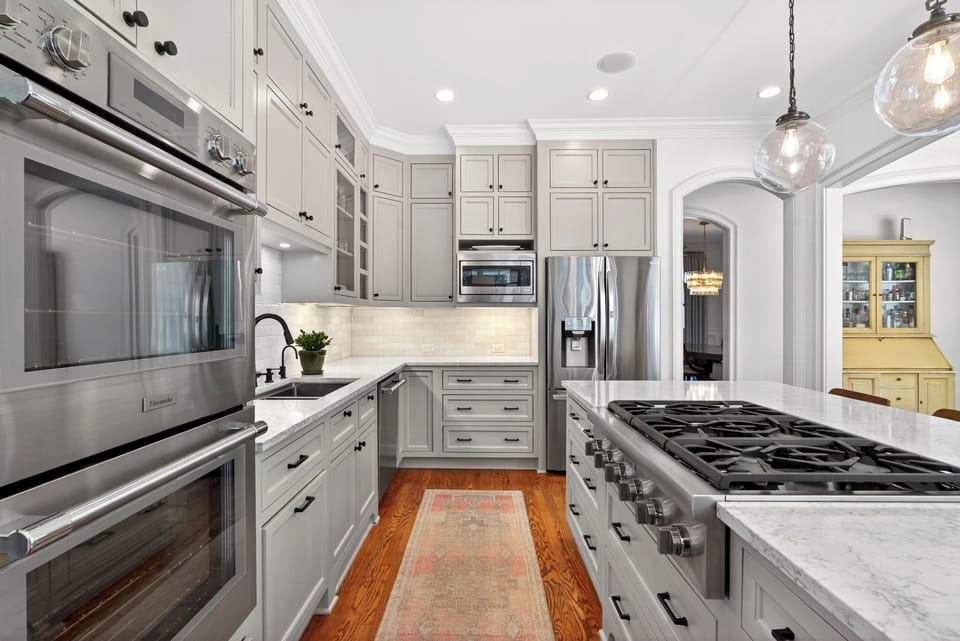 Chef’s kitchen with Thermador range at luxury Midtown Atlanta World Cup rental.