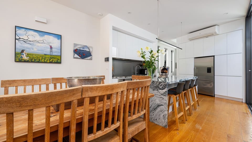 Open plan dining adjacent to kitchen