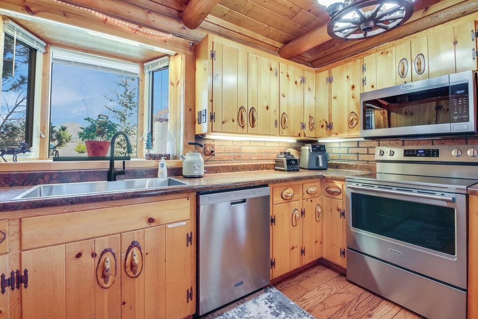 Kitchen with new stainless steel applianes.jpg