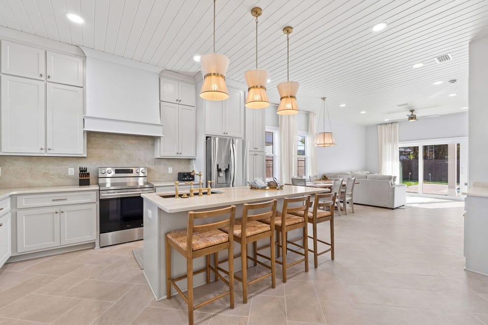 The kitchen features modern, full‑size appliances that make meal prep easy and convenient for guests.