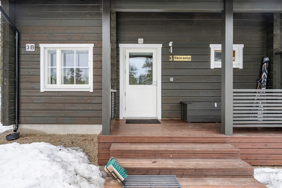 Traditional dark-log architecture with a modern, cozy feel