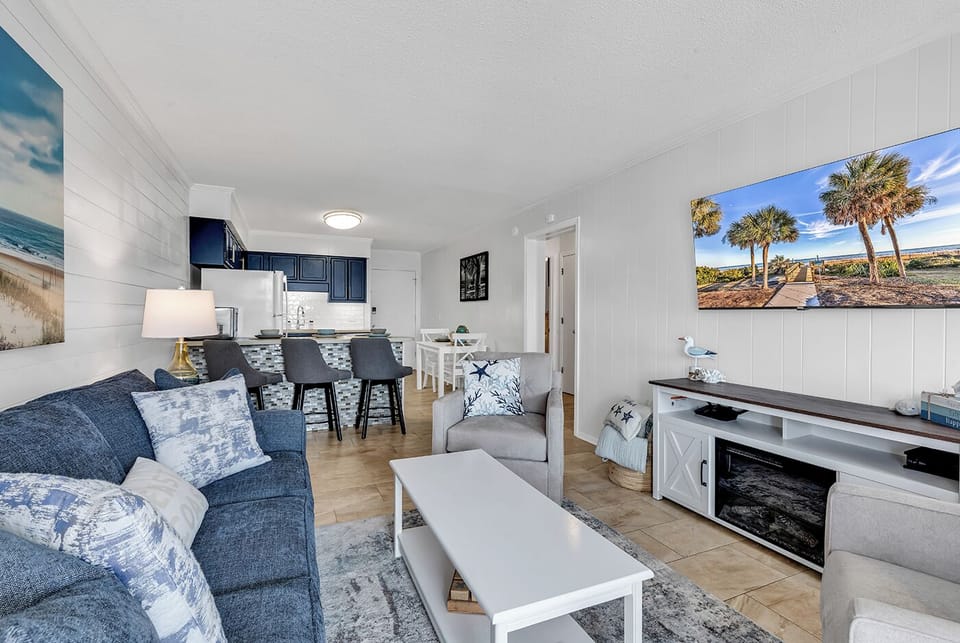Light Coastal Open Living Room into the Newly Updated Kitchen