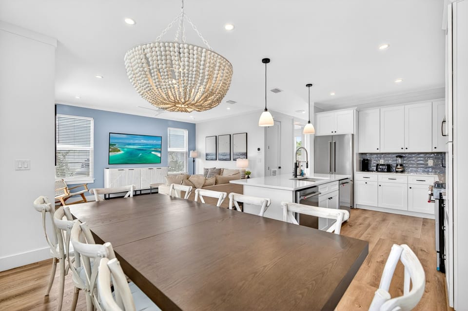 1st Floor - Spacious dining room with seating for 10 plus additional seating for 4 at the kitchen island—ideal for group meals