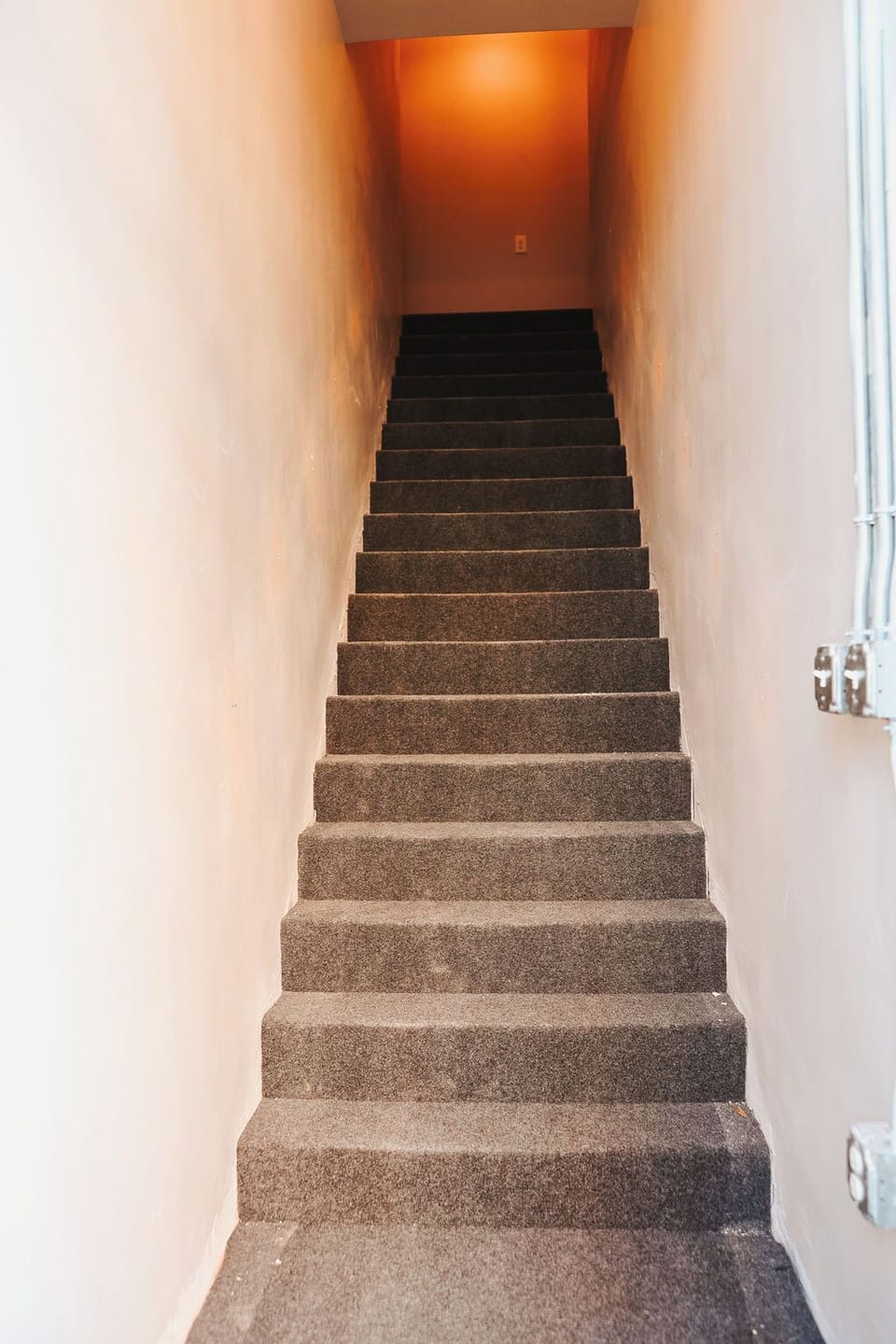 There is a flight of stairs to access the loft. This is shared with another loft