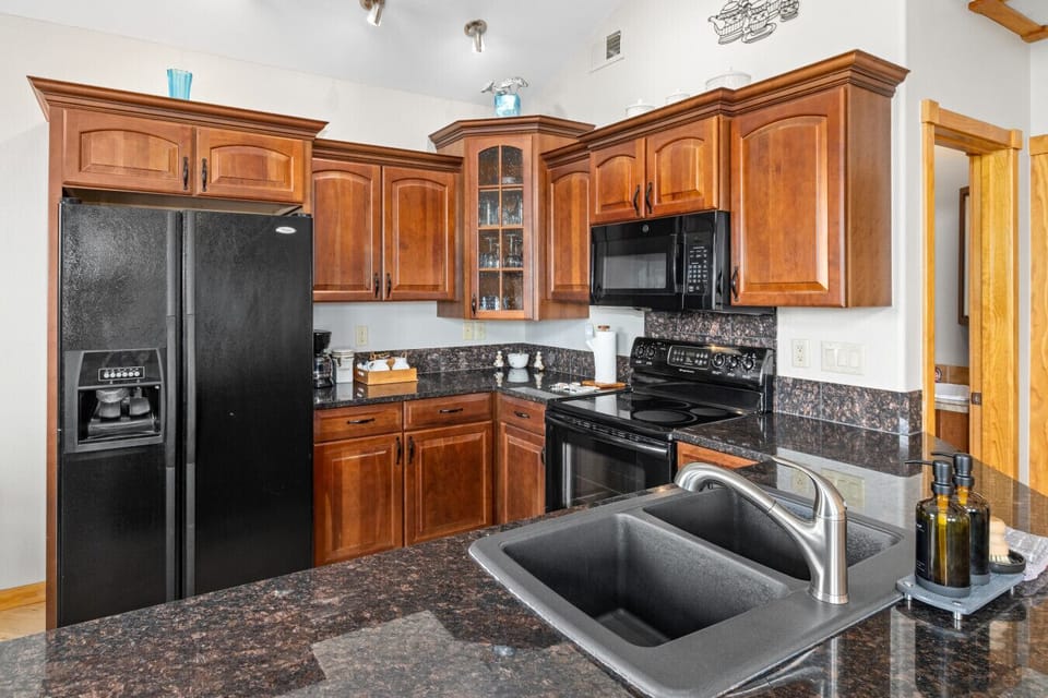 Bright kitchen with everything needed for home cooked meals
