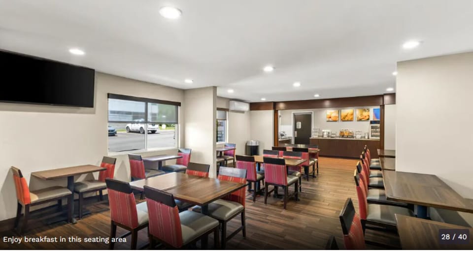 Gather for breakfast in a comfortable dining room with ample seating.