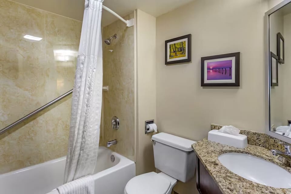 Refresh after exploring with a bright, spotless shower-tub combo.