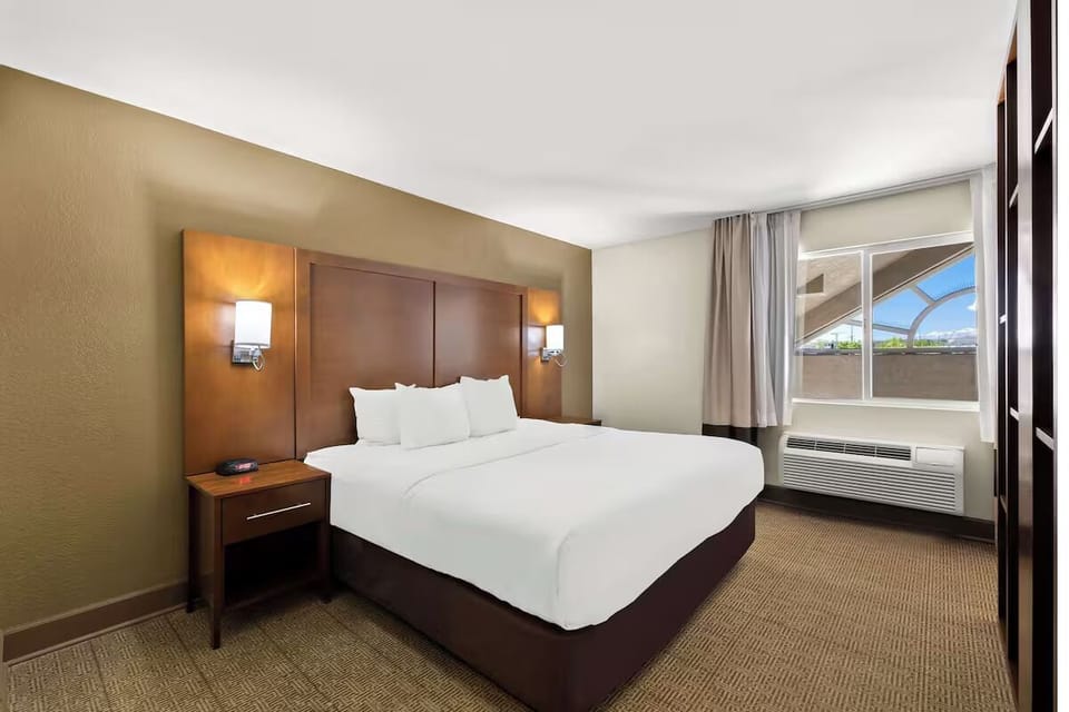 Unwind in a bright king room with serene views.