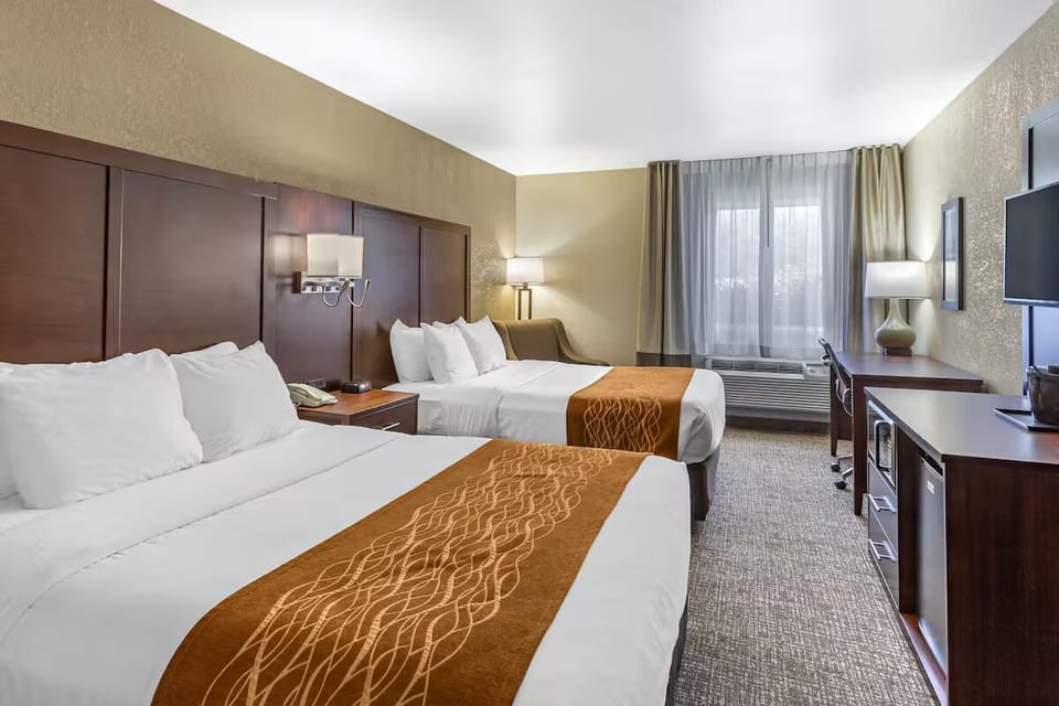 Settle into crisp linens in a comfortable double-queen retreat.