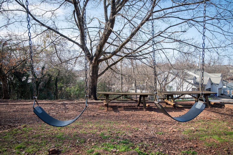 Another look at the quaint park next to the property complete with swings and a slide!
