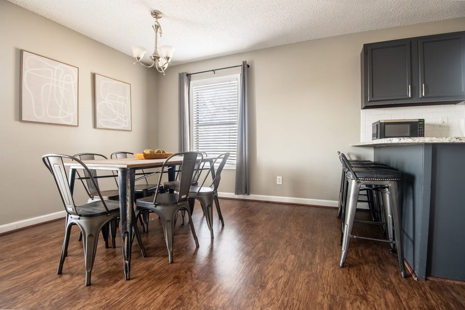 There is plenty of seating in the dining area with both the dining table and the bar seating!