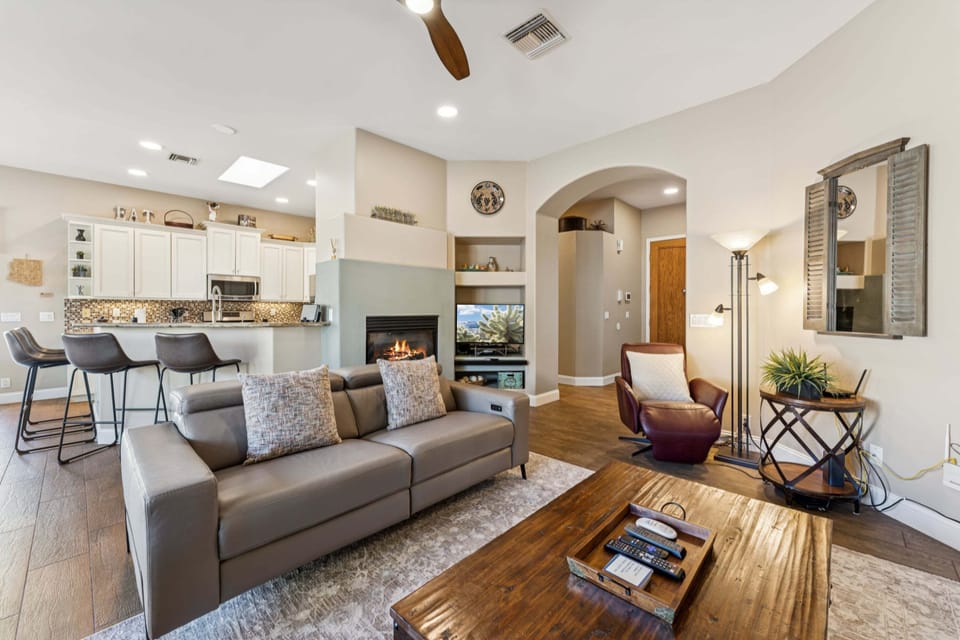 Cozy up in the living room and enjoy the warmth of the fireplace