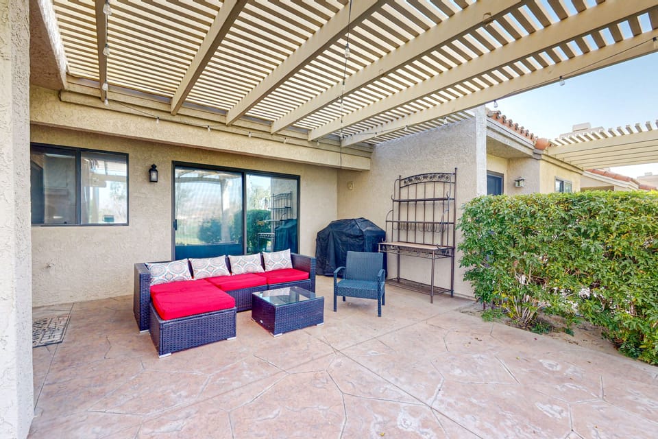 Water-view home on golf course with hot tub, pool, tennis, on-site golf, & patio House in Palm Desert