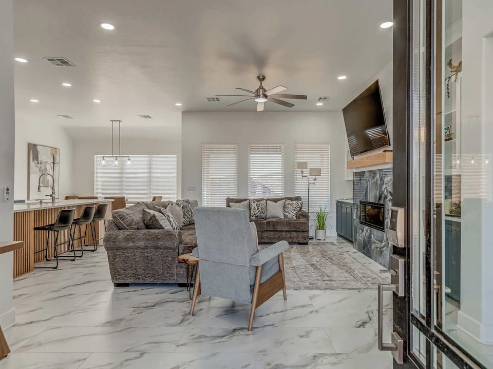 Coziness levels: expert. This living room doesn’t just host guests—it hosts good times.