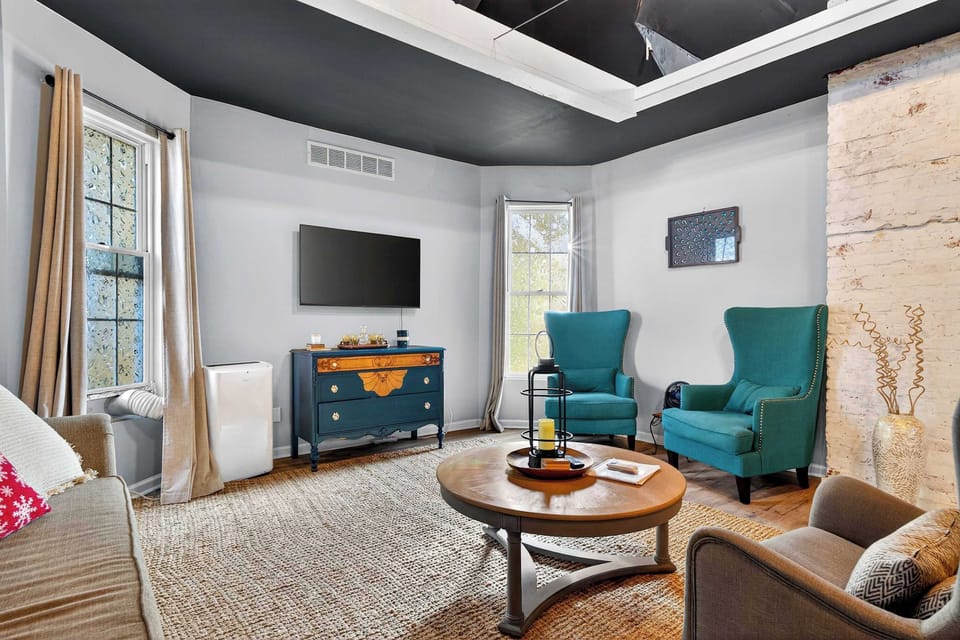 Living Area 2: Enjoy Unit 2’s inviting living area with comfortable furnishings and a relaxing ambiance.