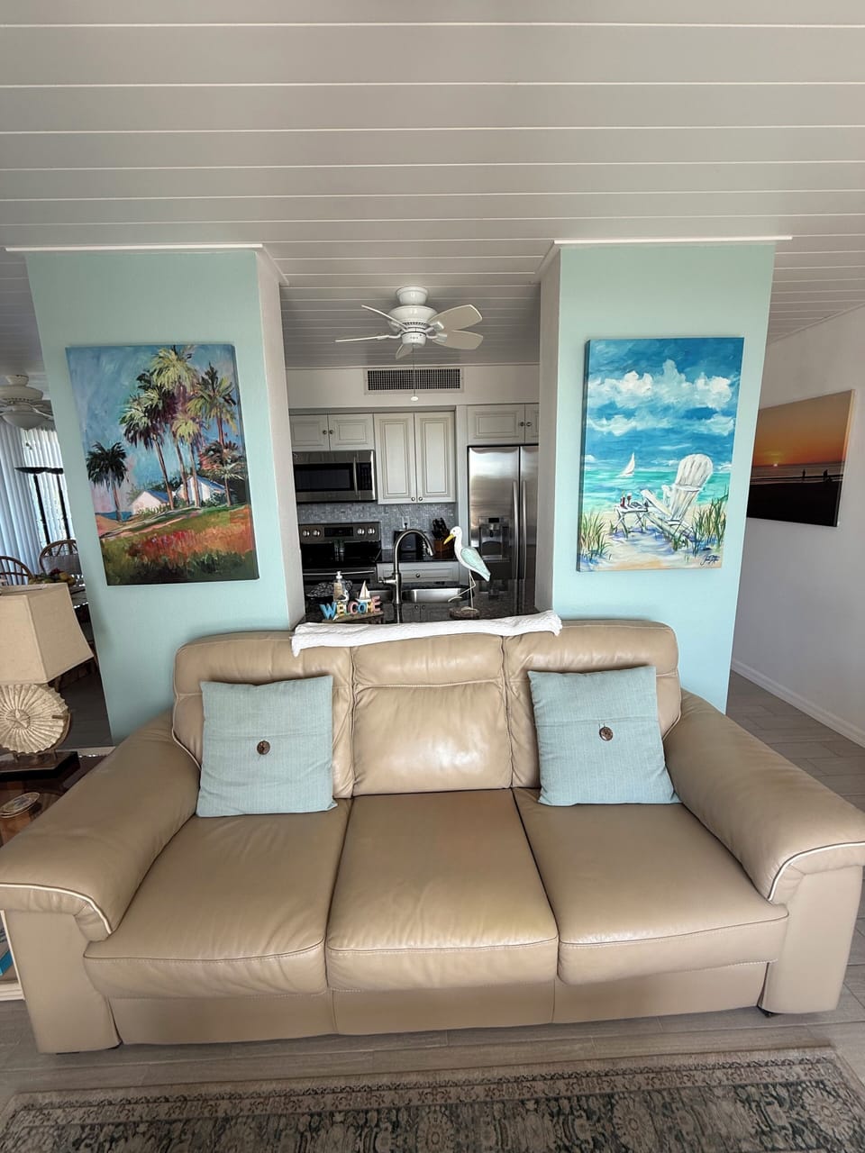 Galley kitchen has new stainless steel appliances and fully equipped for meals.