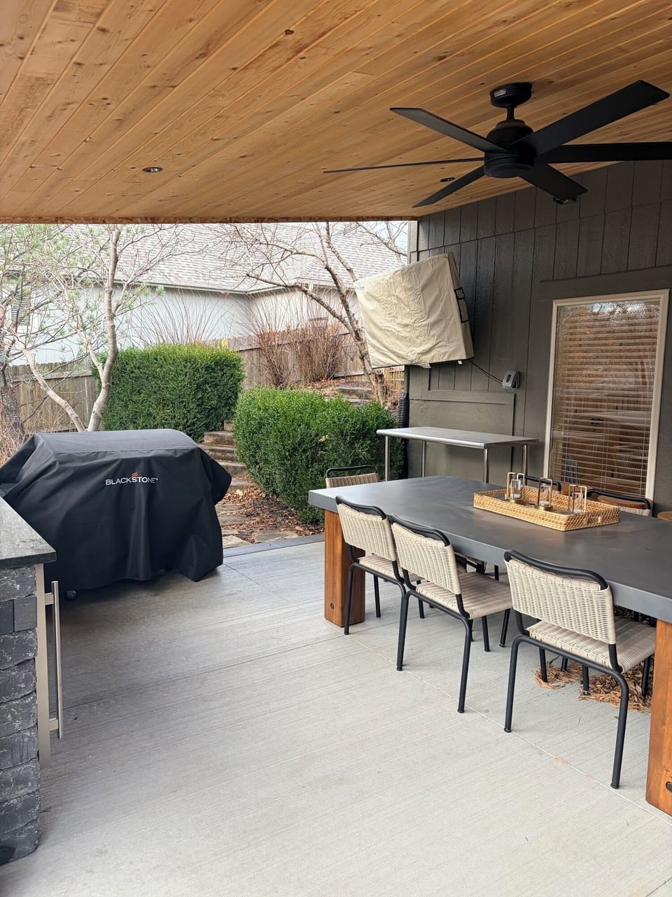 Outdoor dining area with TV