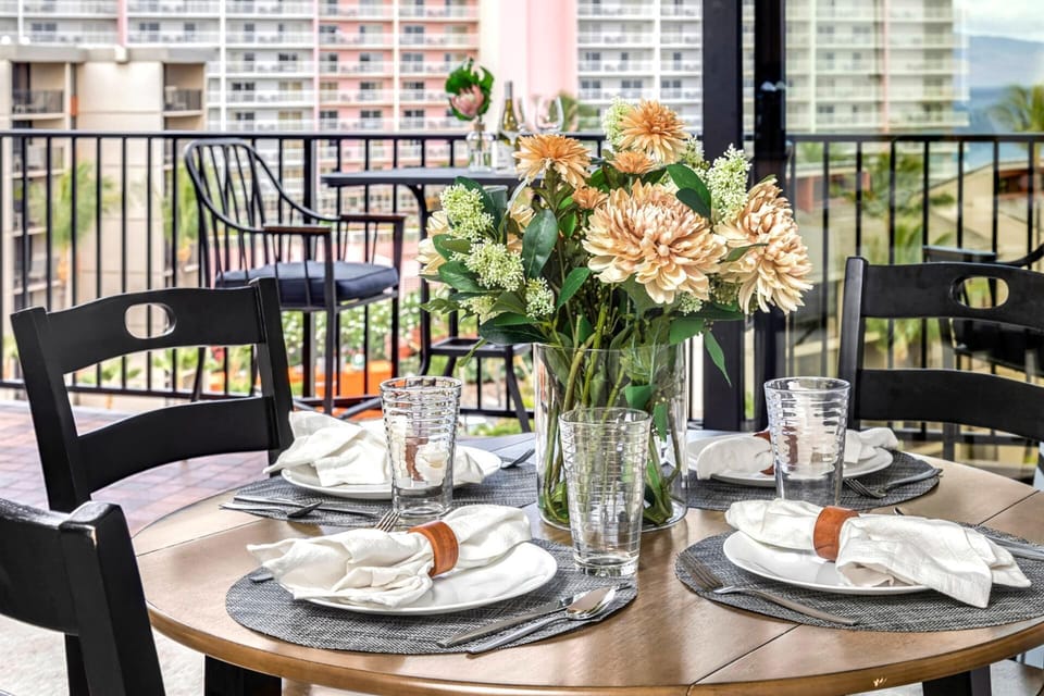 This chic balcony offers a scenic blend of ocean, sky, and resort gardens—perfect for al fresco dining in style    KS-815