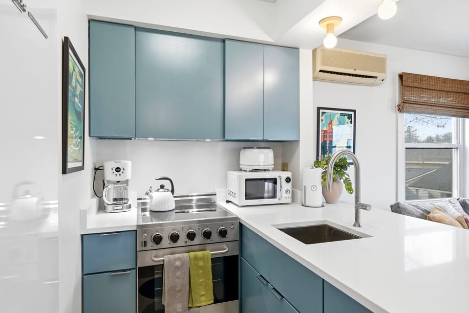 Bar stools, good light, and a stove worth using.