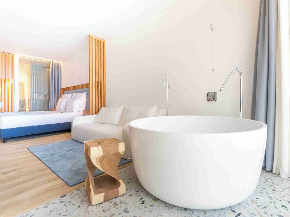 Indulge in an in-room soak with serene seaside calm.