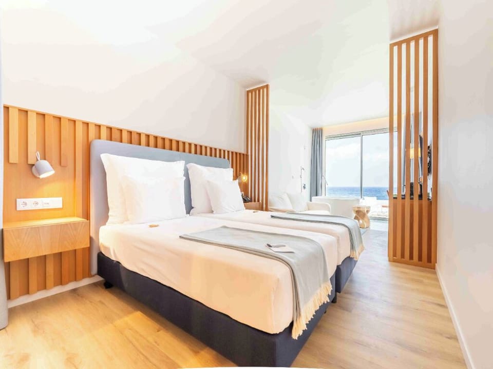 Sink into crisp linens and wake up to ocean light.