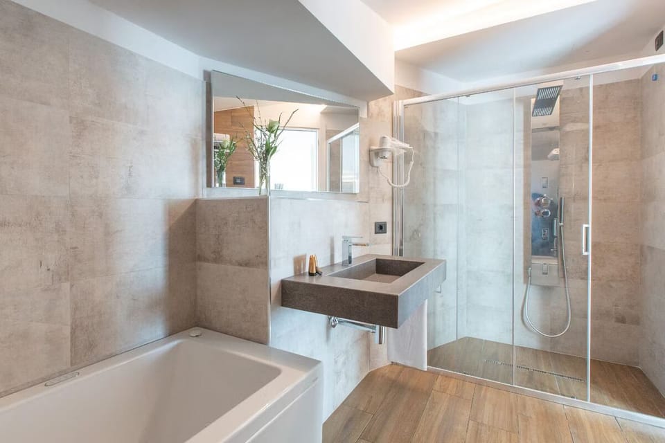Refresh in the bright spa-style bath with rainfall shower.