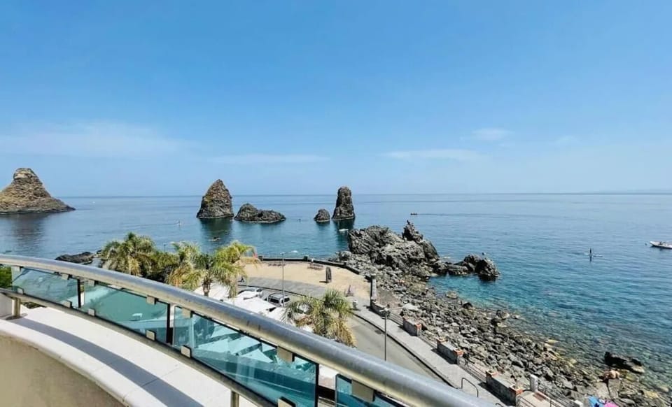 Sip coffee on the balcony with endless sea views.