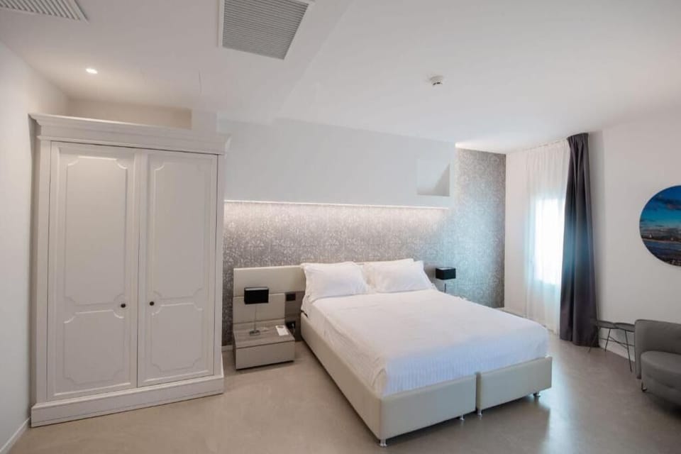 Settle in with generous wardrobe storage and serene lighting.