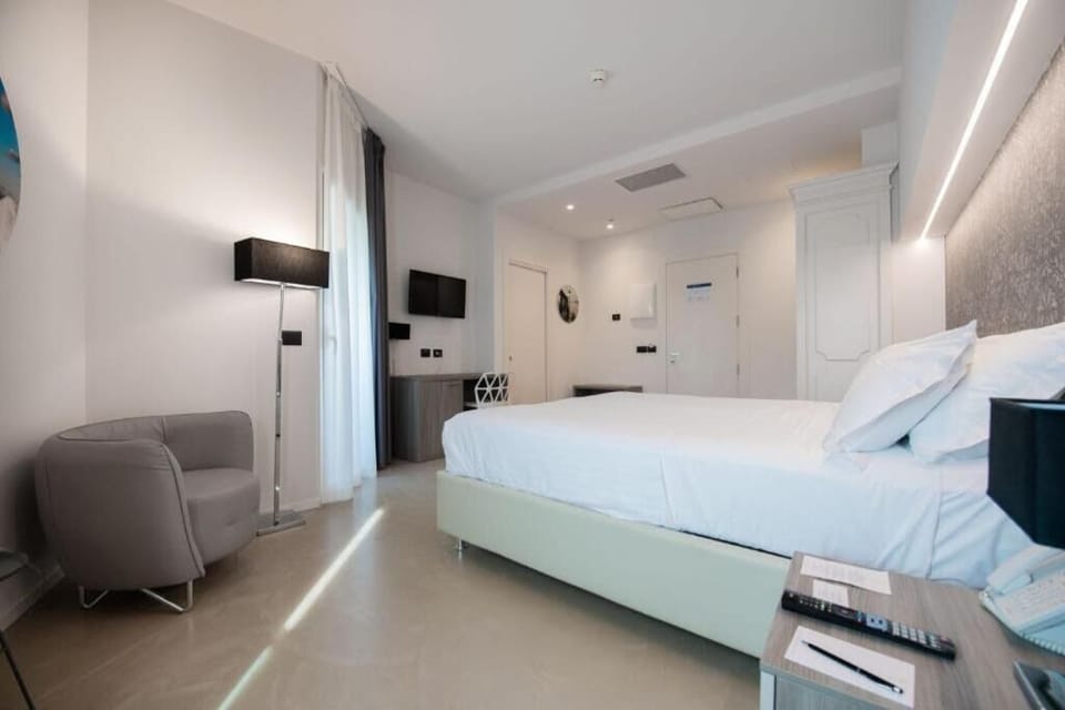 Lounge comfortably after sightseeing in this calm, modern room.