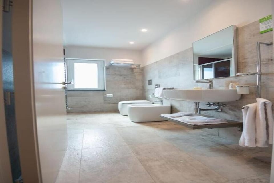 Start the day in a spacious bath with walk-in shower.