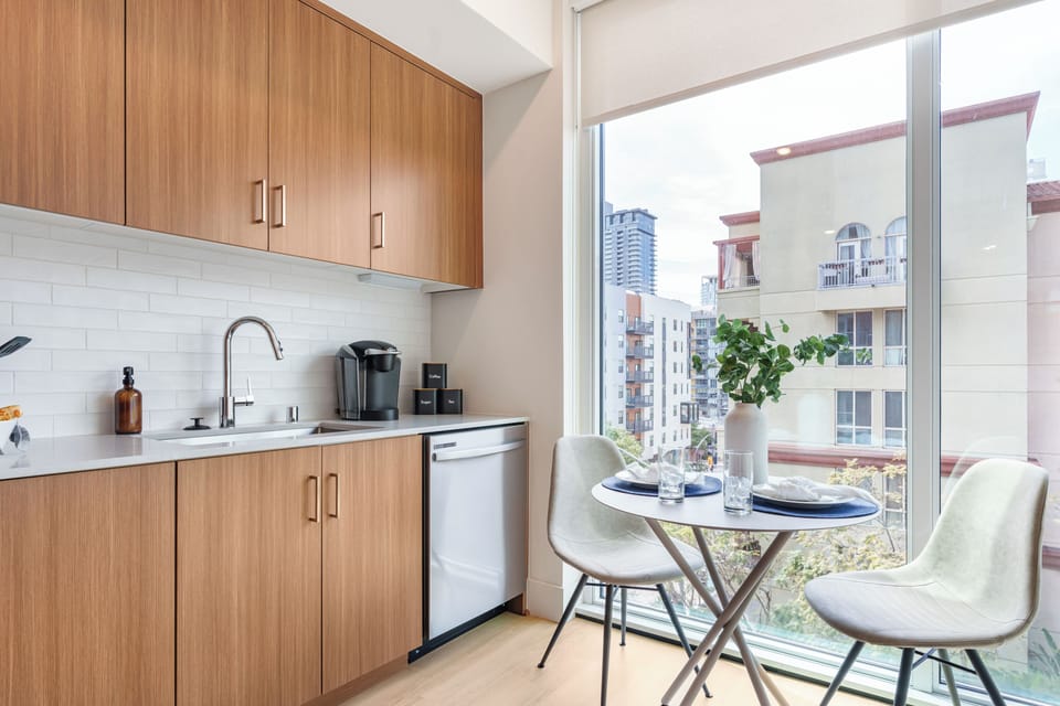 Enjoy an intimate meal by floor-to-ceiling windows that bring the neighborhood’s energy inside.