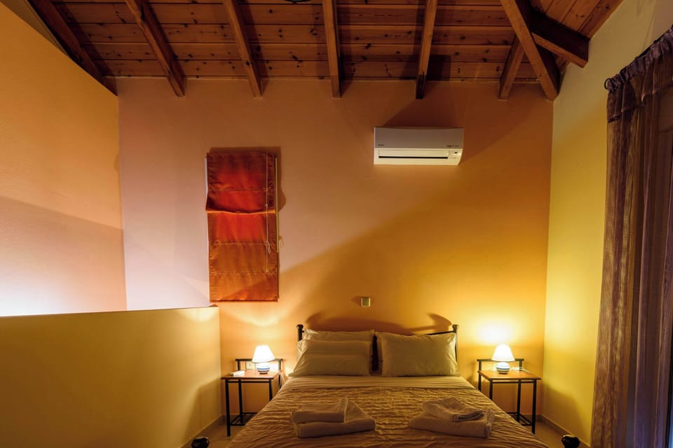 Bedroom with Wooden Ceiling and Soft Night Lighting
