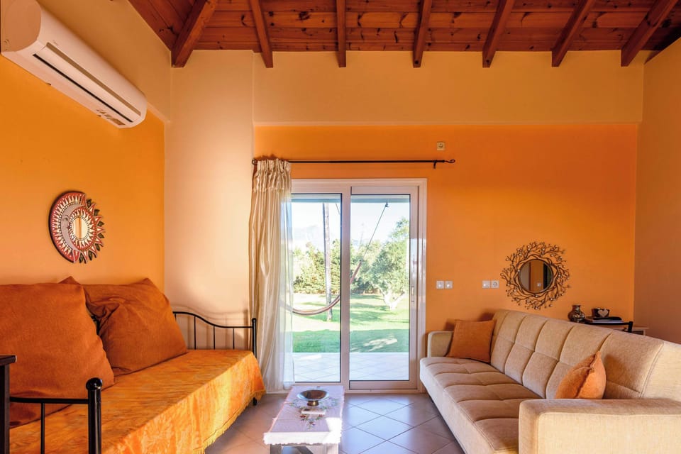 Bright Living Room with Sofa and Direct Garden Access