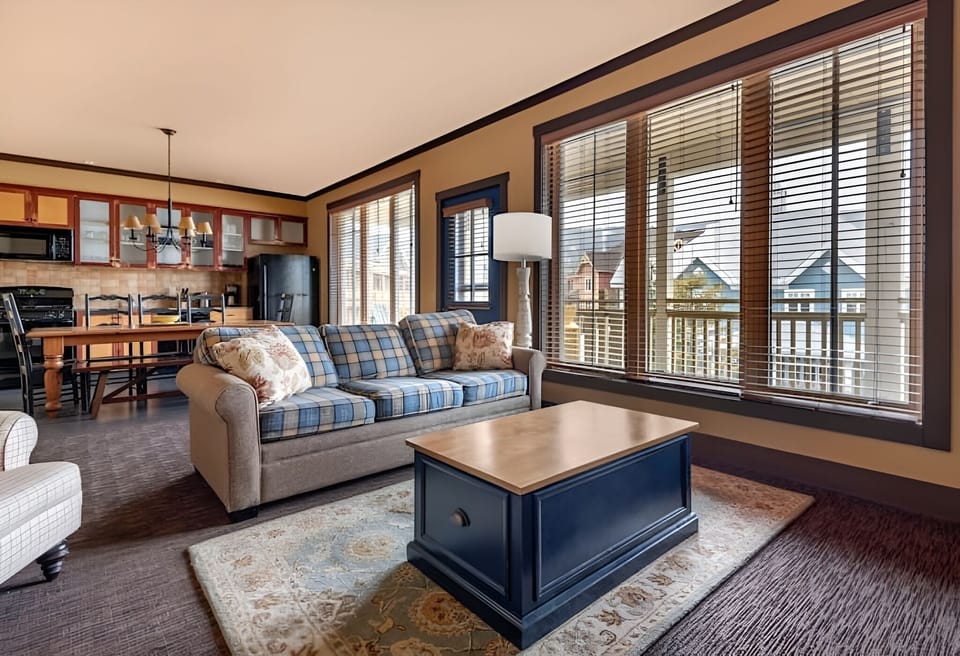Unwind in the sunlit lounge with expansive windows and views.