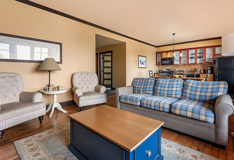 Stretch out together in this bright, open-plan living space.