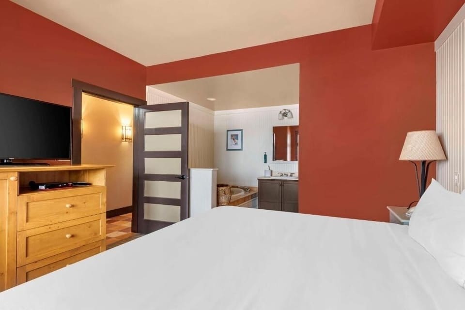 Step into a comfortable suite layout with convenient nearby vanity.