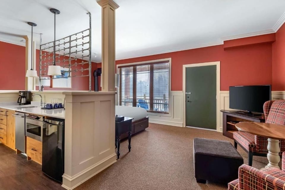 Settle in with an easy kitchenette and relaxed lounge seating.