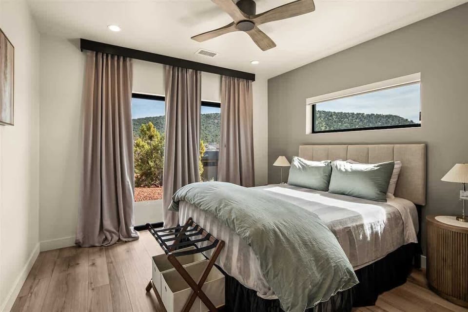 Fourth bedroom downstairs with a comfy queen