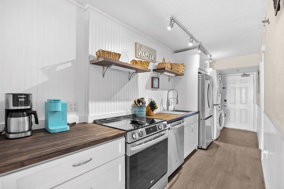Kitchen Area stocked with all the cooking utensils you should need