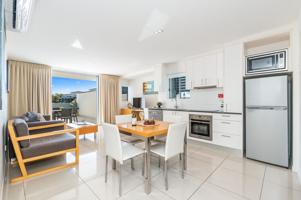 From the sofa to the kitchen and everything in between — this well-appointed living area has all the comforts covered for your stay.