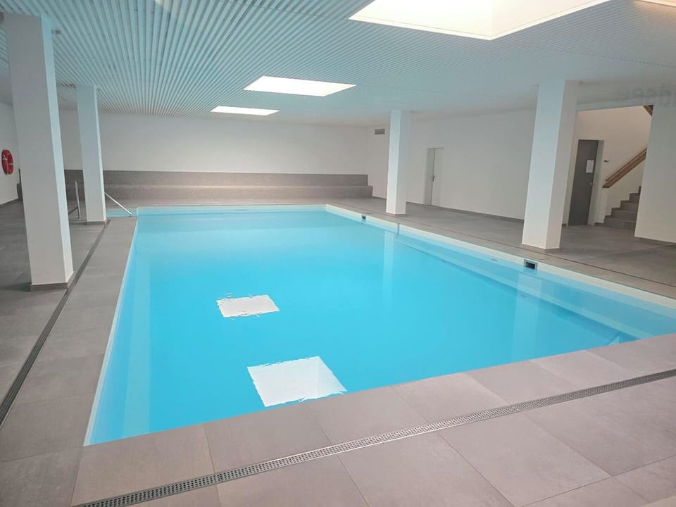 Flooring, Floor, Ceiling, Swimming Pool, Interior Design, Composite Material, Resort, Tile, Daylighting