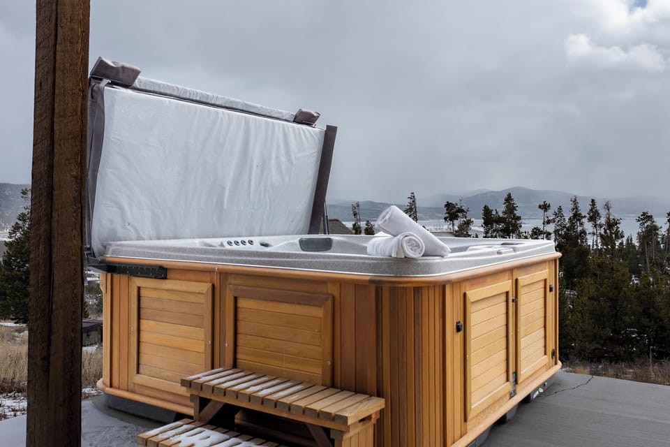 Soak your worries away in this private hot tub, complete with fluffy towels and stunning mountain views for the ultimate relaxation.